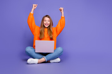 Full length photo of teenage girl job done freelance market sell her service as copywriter use computer isolated on purple color background