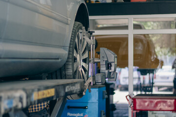 Tire Alignment in auto repair shop