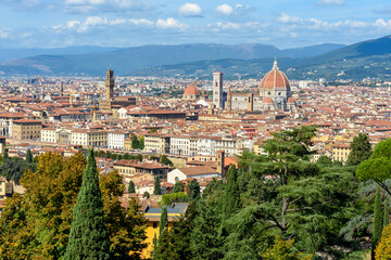 Fototapeta na wymiar Florence cathedral (Duomo) and Palazzo Vecchio over city center, Italy