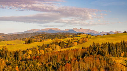 Autumn rural landscape with The Western Tatras mountains in Slovakia at sunset in a background. The...