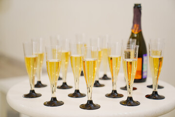 Disposable plastic champagne glasses. 