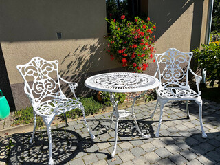 Set of white Outdoor Garden furniture, table, chair.