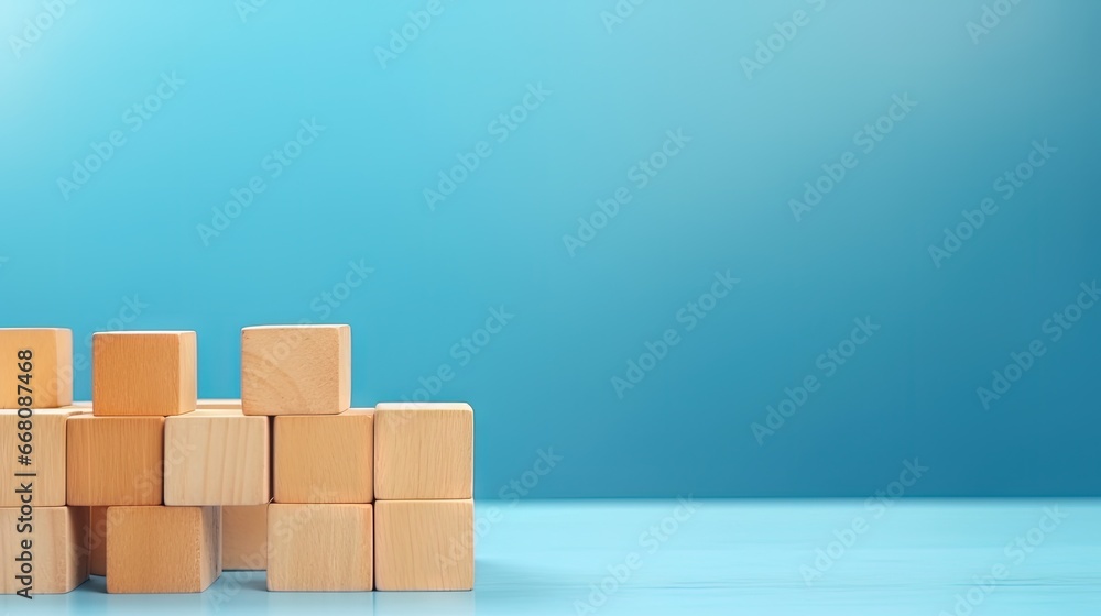 Poster wooden cubes on blue table with space for text representing business mission core values and solutio