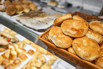 baked pies with different fillings, sweet or salty. Various hot dishes . Glass Showcase in a buffet or self-service restaurant.