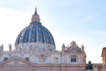 Fragment of Basilica of St. Peter in the Vatican and column on Saint Peters square in Vatican