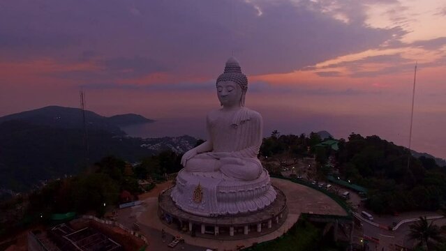 Amazing sweet sky in sunset at Phuket big Buddha. .The beauty of the statue fits perfectly with the charming nature..amazing pink sky in sweety sunset at Phuket big Buddha.