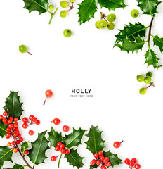 Holly leaves red green berry christmas decoration isolated on white background .