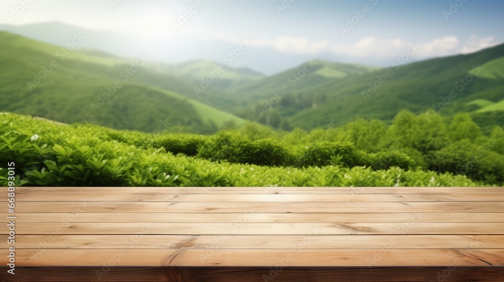 Aufkleber Wooden table top with blurred green tea mountain and grass field representing a fresh and relaxing concept for product display or design layout with available copy space