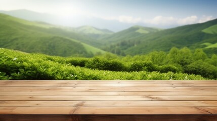 Wooden table top with blurred green tea mountain and grass field representing a fresh and relaxing...