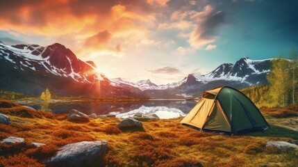 Vintage photo of a tourist tent at sunrise in the Norwegian mountains during spring camping - obrazy, fototapety, plakaty