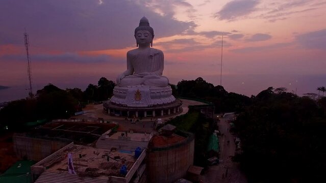 Amazing sweet sky in sunset at Phuket big Buddha. .The beauty of the statue fits perfectly with the charming nature..amazing pink sky in sweety sunset at Phuket big Buddha.