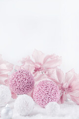 Merry Christmas. Christmas banner in pink color on a white Christmas background. Christmas background, pink xmas holiday card. Christmas card pink balls