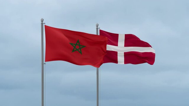 Denmark flag and Morocco flag waving together on cloudy sky, endless seamless loop, two country relations concept
