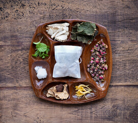 Respiratory allergy scent bag contains patchouli, honeysuckle flowers and other herbs on the old...
