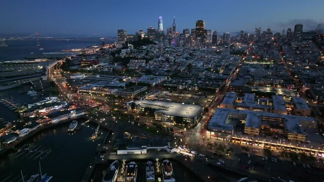 San Francisco, California, USA -night aerial video view of San Francisco Fisherman's Wharf, Chinatown - North Beach, Nob Hill, Russian Hill Districts and Skyline in SoMa district - footage