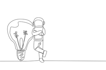Single one line drawing young astronaut lean on giant lightbulb. Have big and brilliant ideas related to expeditions, but waiting for right time to do it. Continuous line design graphic illustration