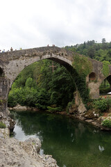 Fototapeta na wymiar Roman Bridge of Cangas de Onís, town in Asturias (Spain)