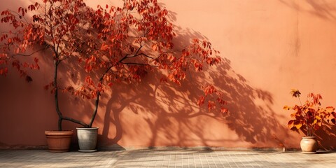 The shadow of the leaves on the red orange brick wall. House, sidewalk. Exterior street outdoors. Background. Space for product design object. Moskup stage presentation template.