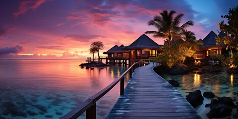 Foto auf Acrylglas Bora Bora, Französisch-Polynesien Amazing sunset panorama at Maldives. Luxury resort villas seascape with soft led lights under colorful sky. Beautiful twilight sky and colorful clouds. Beautiful beach background for vacation