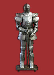Old knight armor on red background