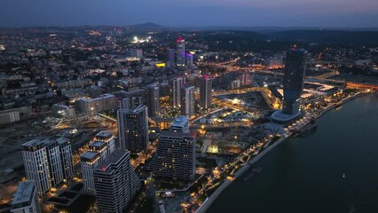 Aerial Drone Night Shot of Belgrade city, Serbia. Capital in Blue Hour and Night time, View from above.