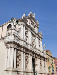 Fototapeta na wymiar The Church of Santa Maria Zobenigo or Chiesa di Santa Maria del Giglio in Venice, Italy. The edifice is situated on the Campo Santa Maria Zobenigo, west of the Piazza San Marco.