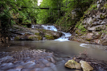 Fototapeta premium mountain river in the forest Cascada Slanic Moldova