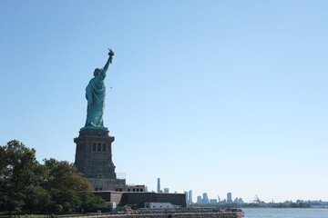 Statue of Liberty with New York skyline in background