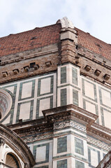 Details of the exterior of the di Santa Maria del Fiore or Cathedral of Saint Mary of the Flower - the main church of Florence, Tuscany, Italy.