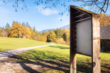 Empty Information board in nature showing trail map © 24K-Production