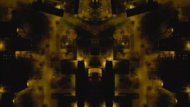 Birds eye shot of night urban borough. Buildings and lighted public area. Abstract computer effect digital composed footage