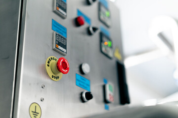 Temperature control panel with buttons on a refrigerator in specialty alcoholic beverage production...