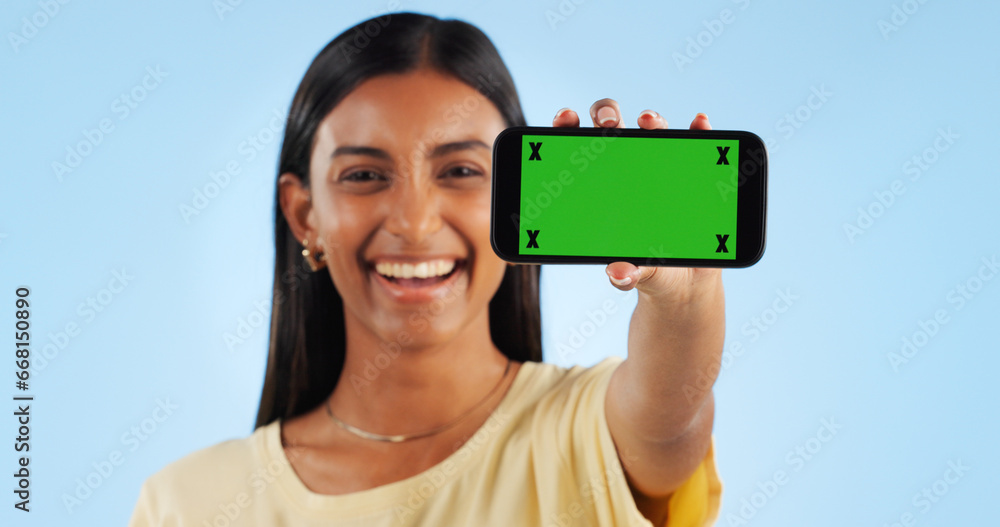 Sticker Cellphone green screen, studio portrait and happy woman show web announcement, mobile info or app chroma key UI. Tracking markers, smartphone mockup space and Indian person face on blue background