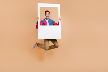 Full length shot of funky active businessman hold paper photozone portrait memories event occasion...