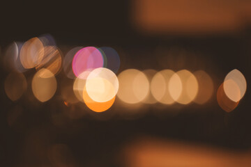Defocussed lights giving attractive bokeh, night time shot with space for text