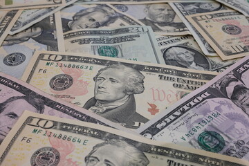 Obraz na płótnie Canvas Pile of United States Dollars close up