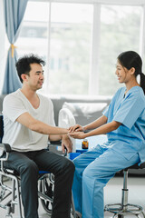 Obraz premium doctor holding patient's hand Cheer and encourage while checking your health. Trust your health and mind