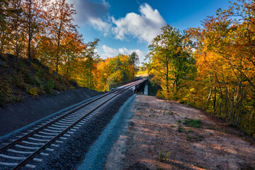 Autumnal scenery and the railway bridge in Rutki, Kashubia. Poland - obrazy, fototapety, plakaty