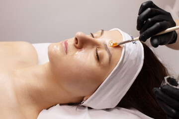 Cosmetology beauty procedure. Young woman skin care. Beautiful female person. Rejuvenation...