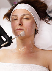 Cosmetology beauty procedure. Young woman skin care. Beautiful female person. Rejuvenation...