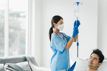 Female doctor injects saline to treat patient in the laboratory