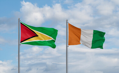 Ivory Coast and Guyana flags, country relationship concept