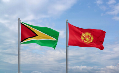 Kyrgyzstan and Guyana flags, country relationship concept