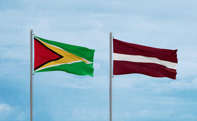 Latvia and Guyana flags, country relationship concept