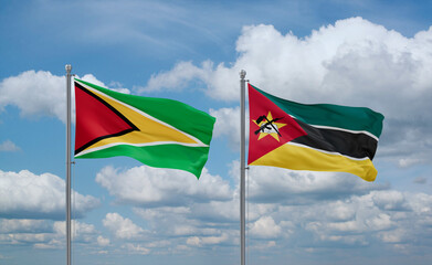 Mozambique and Guyana flags, country relationship concept