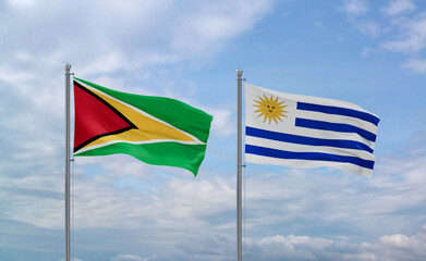 Uruguay and Guyana flags, country relationship concept