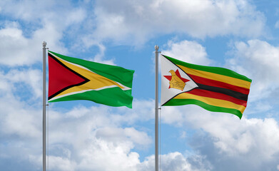 Zimbabwe and Guyana flags, country relationship concept