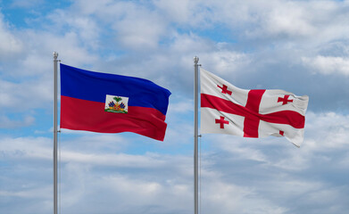 Georgia and Haiti flags, country relationship concept