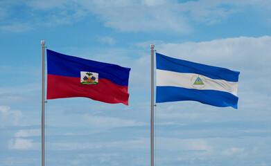 Nicaragua and Haiti flags, country relationship concept