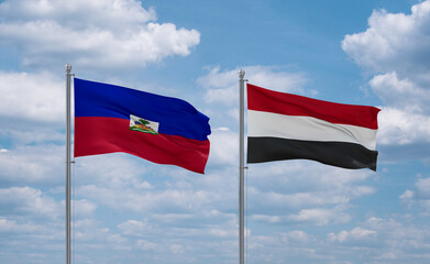Yemen and Haiti flags, country relationship concept